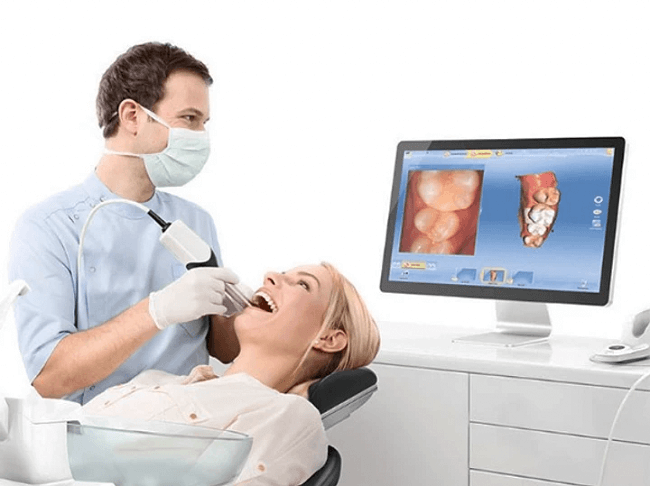A dentist scaning Intraorally for dentures