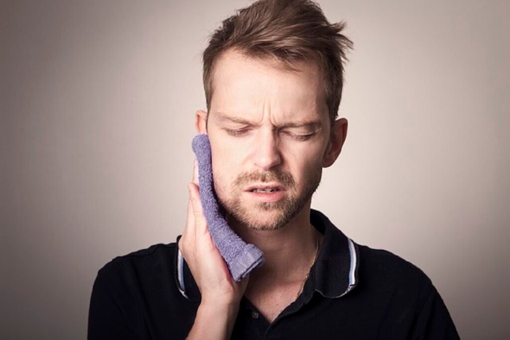 Man suffering from tooth pain