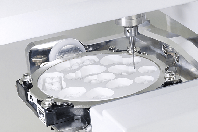 comparing a dental CAD/CAM machine