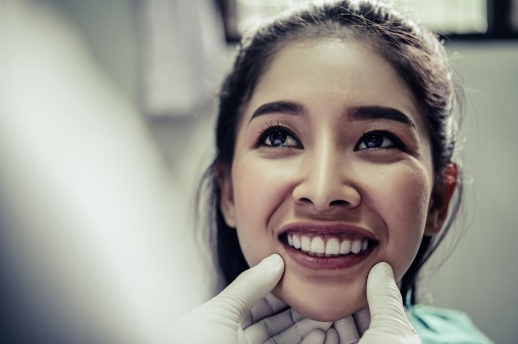 dentist checking the teeth’s hygiene